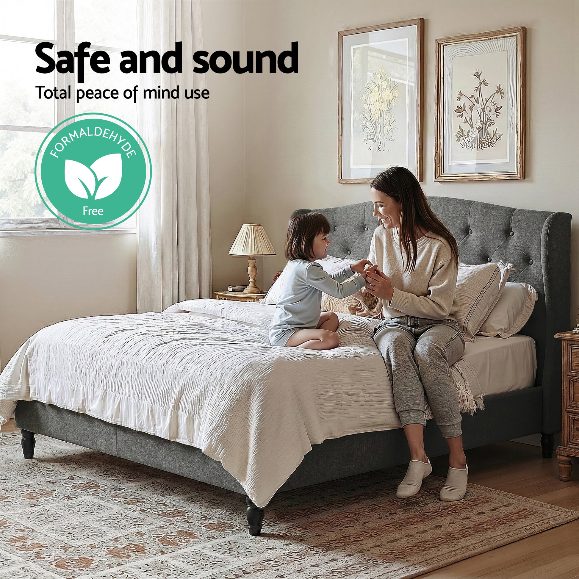Pierre Double Bed Frame with Wingback Headboard – Grey in bedroom scene with woman and child seated on bed