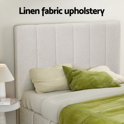 Aldinga Double Bed Frame Beige with linen fabric upholstery, beige color, and assorted green pillows in a bedroom setting