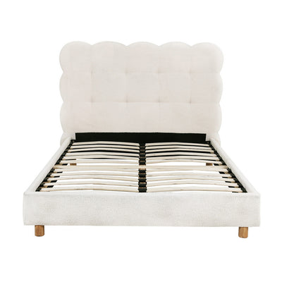 Cloud King Single Bouclé Bed Frame – White with tufted cloud-shaped headboard, wooden slats, and wooden legs on white background