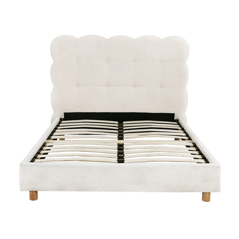 Cloud King Single Bouclé Bed Frame – White with tufted cloud-shaped headboard, wooden slats, and wooden legs on white background