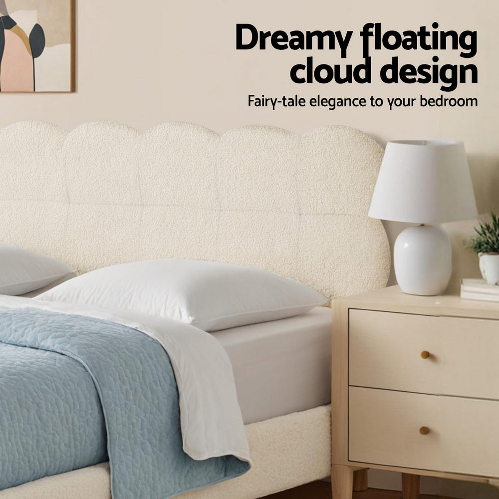 Cloud King Single Bouclé Bed Frame – White with plush curved headboard, bedside table, and lamp in bedroom setting