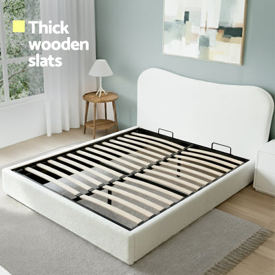 Darragh Double Boucle Gaslift Storage Bed Frame – White with thick wooden slats and soft boucle upholstery in bright bedroom setting