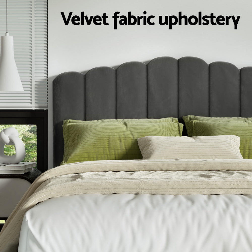 Fion Double Velvet Storage Bed - Grey with scalloped velvet headboard and green pillows in modern bedroom setting