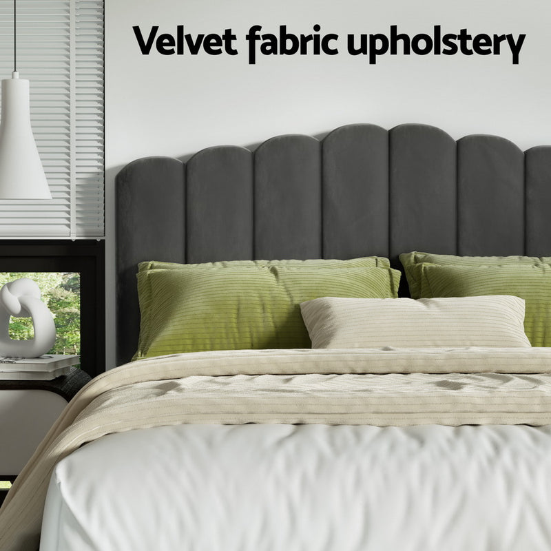 Fion Double Velvet Storage Bed - Grey with scalloped velvet headboard and green pillows in modern bedroom setting