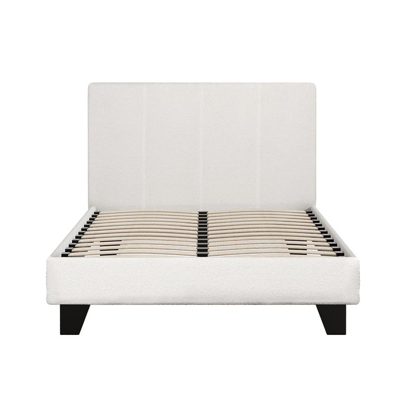 Coogee King Single Bed Frame Cuddly White Bouclé with smooth fabric upholstery and wooden slats on black legs.