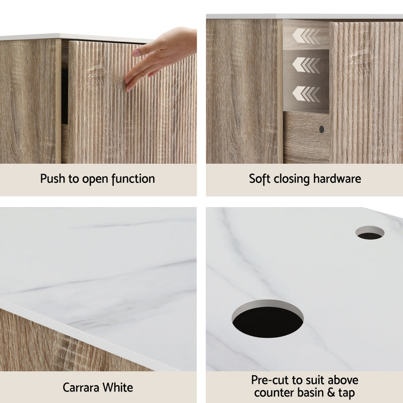 Close-up details of Vanity Unit 915mm with Basin Oak showing push-open door, soft-close hardware, Carrara white top, and pre-cut basin holes