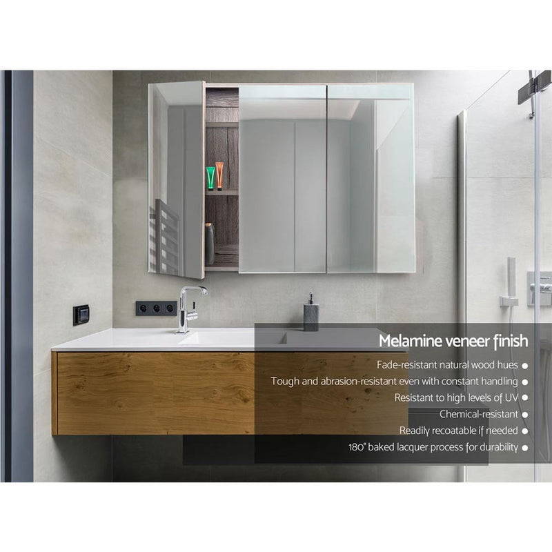 Bathroom Mirror Cabinet 900x720mm Oak with melamine veneer finish, wall-mounted with mirrored doors and wooden storage drawer.