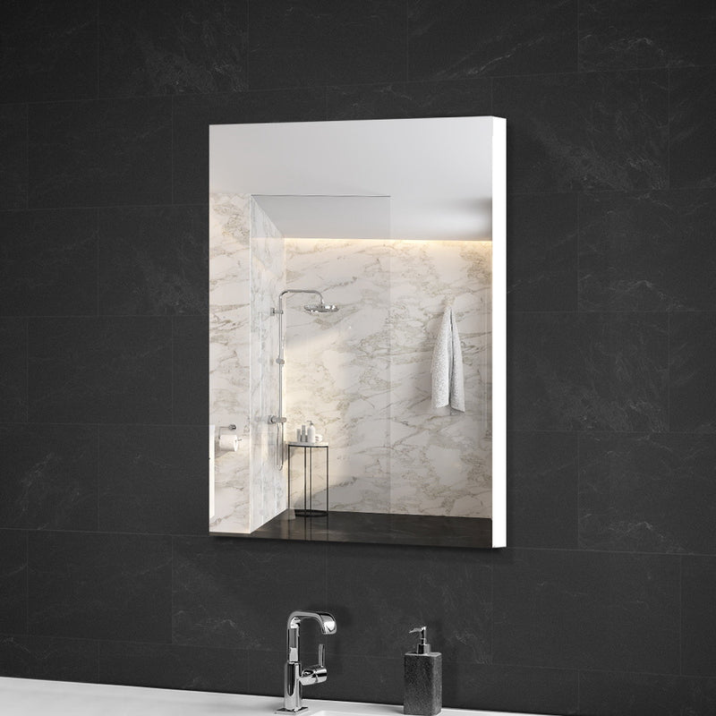 Bathroom Mirror Cabinet 450x720mm White with high gloss finish mounted on dark tiled wall above sink and faucet