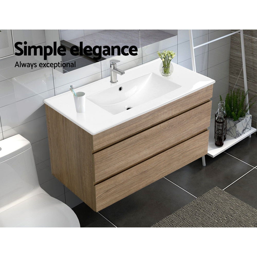 Vanity Unit 915mm with Basin Oak featuring a wall-mounted design, two drawers, and a white ceramic basin