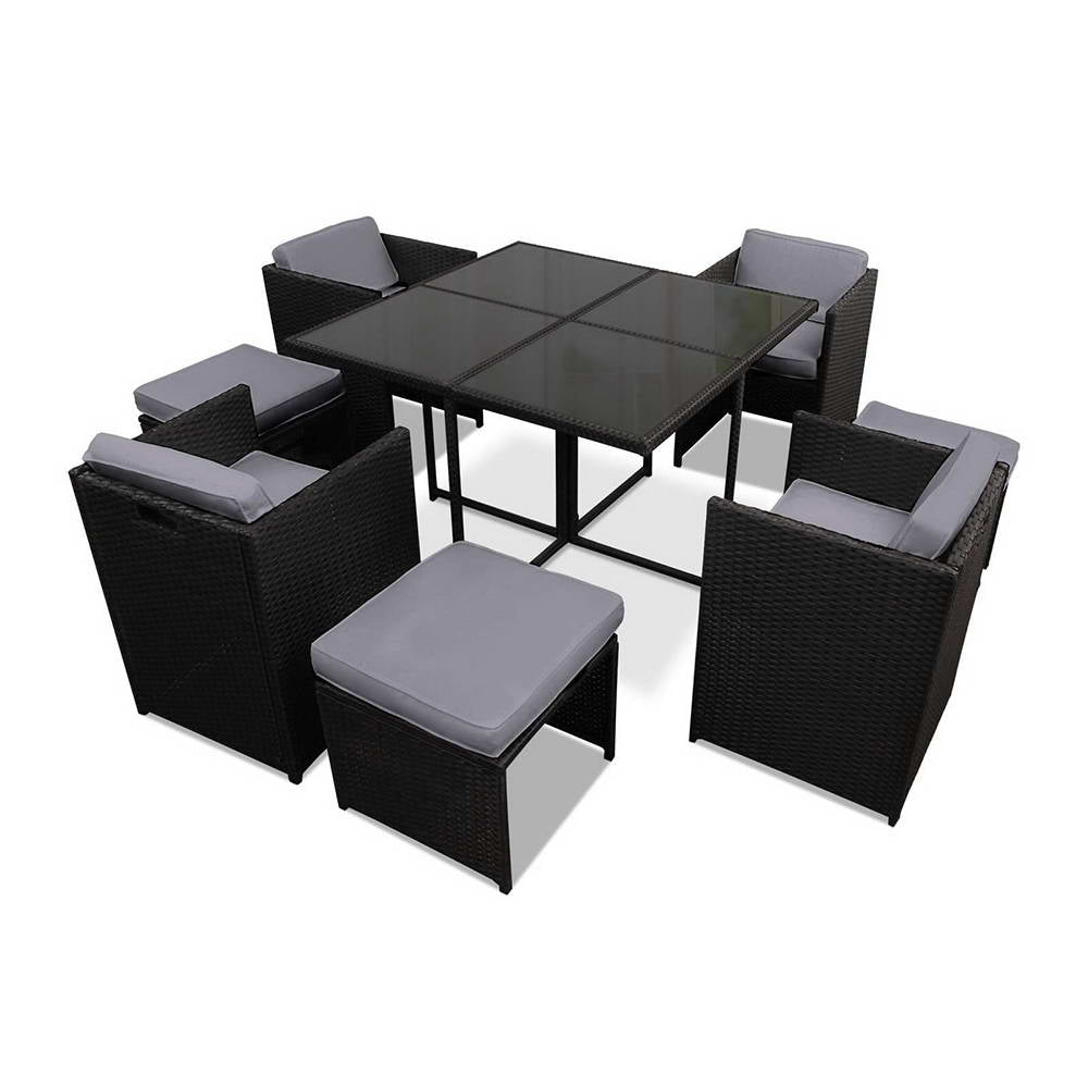 Outdoor Dining Set 9 Piece Wicker Table Chairs Setting Black with glass top table and cushioned wicker chairs.