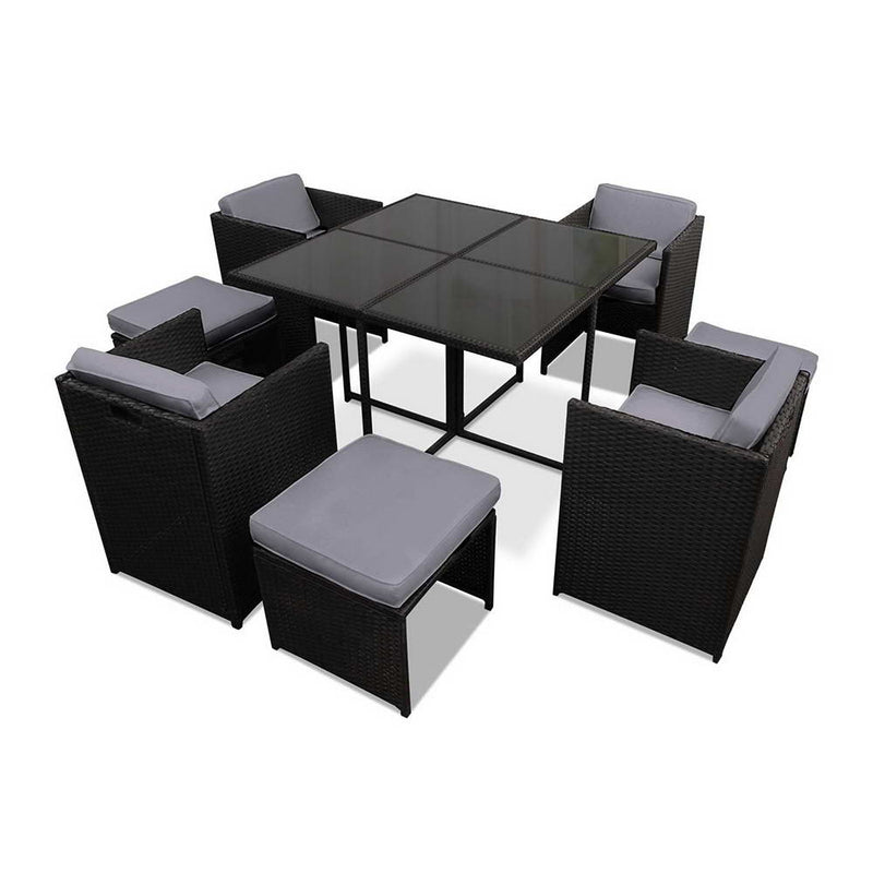 Outdoor Dining Set 9 Piece Wicker Table Chairs Setting Black with glass top table and cushioned wicker chairs.