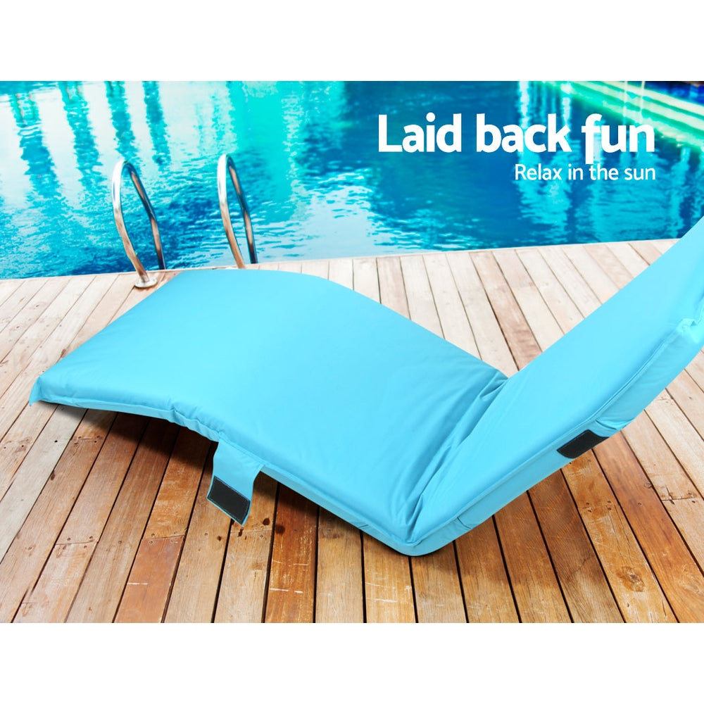 Adjustable Beach Sun Pool Lounger - Blue on wooden deck by pool, with adjustable backrest and durable fabric.