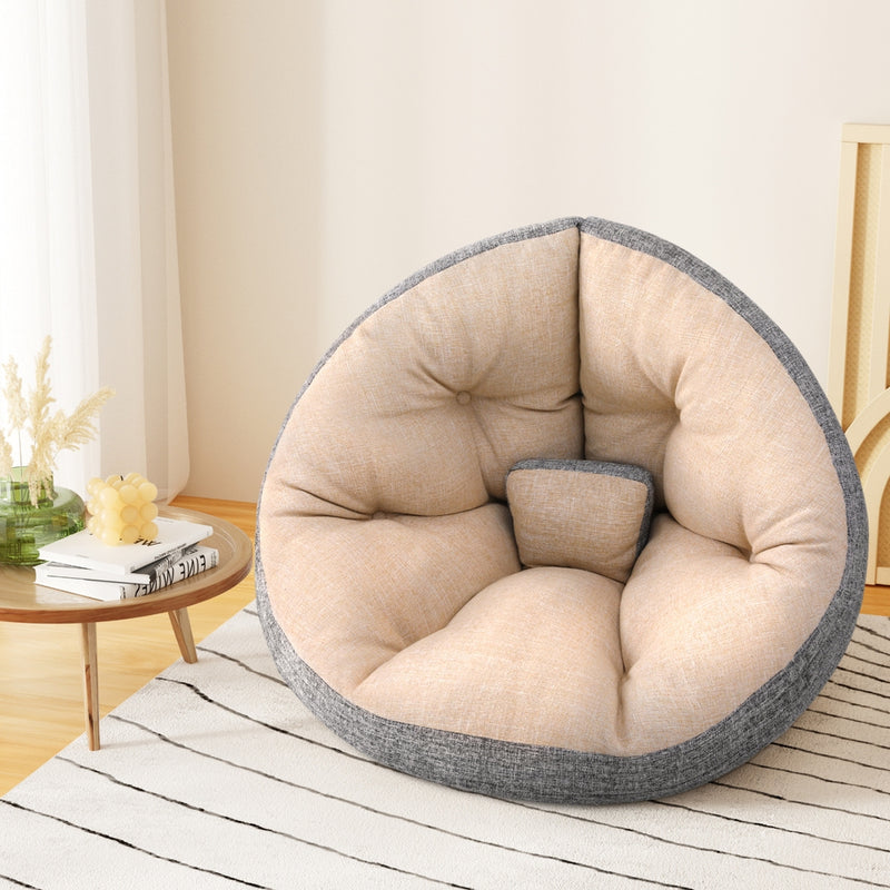 Floor Lounge Day Bed Chair - Beige with tufted cushions and contrasting gray trim, set on a striped rug in living space