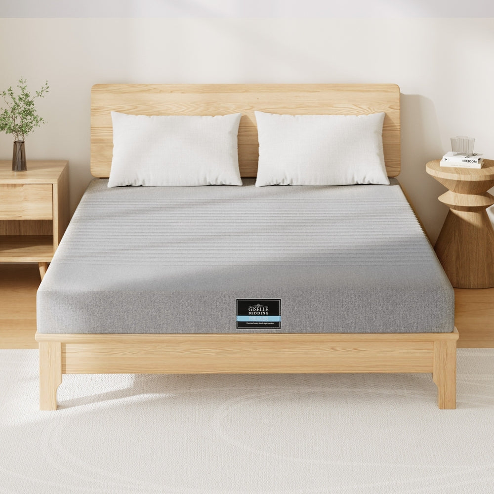 Cool Gel Memory Foam Mattress Charcoal 7-Zone Washable Bamboo Cover 15cm Double on wooden bed frame in bedroom setting