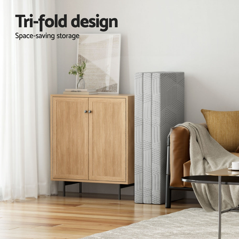 3-Foldable Mattress Folding Foam Double in gray with tri-fold design standing next to wooden cabinet in living room
