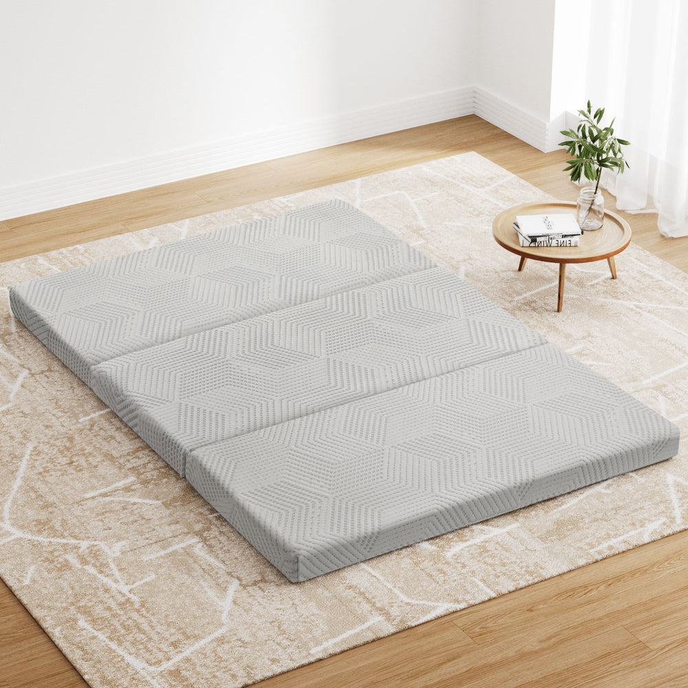 3-Foldable Mattress Folding Foam Double in gray with geometric pattern, shown unfolded on beige rug in bright room