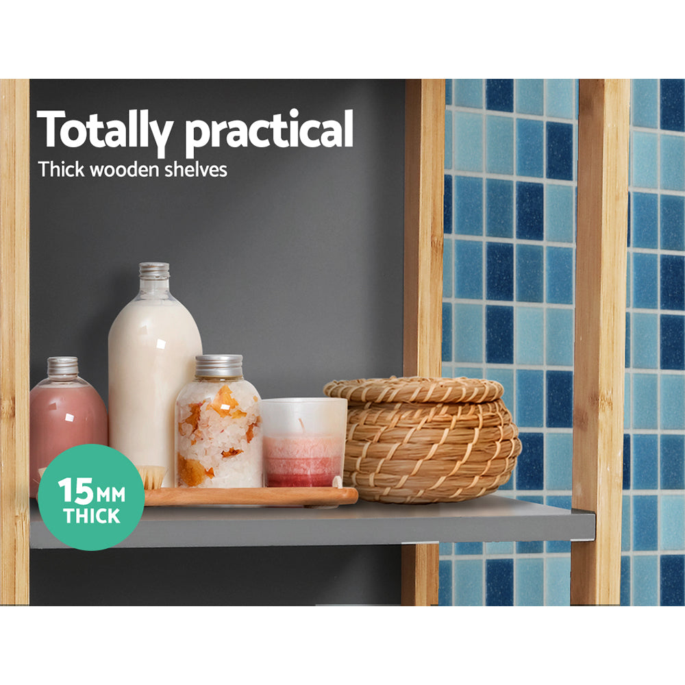 Bathroom Cabinet 115cm Bamboo Shelf with thick wooden shelves holding bottles and woven storage basket against tile background