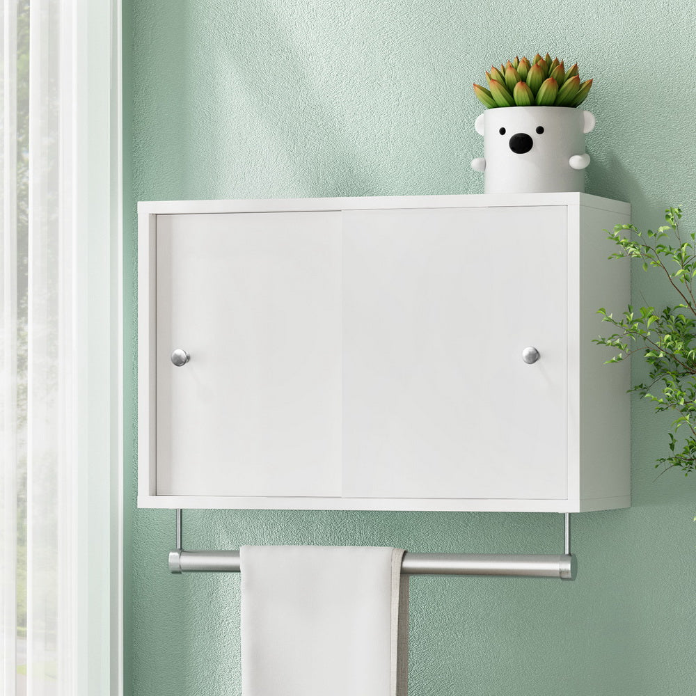 Bathroom Storage Cabinet Wall Mounted Cupboard Vanity Medicine Organiser in white with two doors and towel rail against green wall
