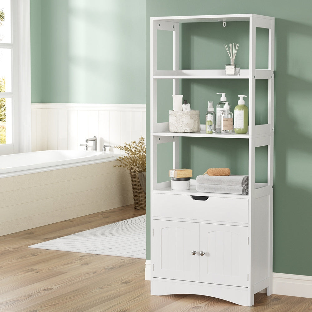 Bathroom Floor Storage Cabinet with 2 Drawers 3 Open Shelves 2 Doors White in bathroom setting with toiletries and towels.