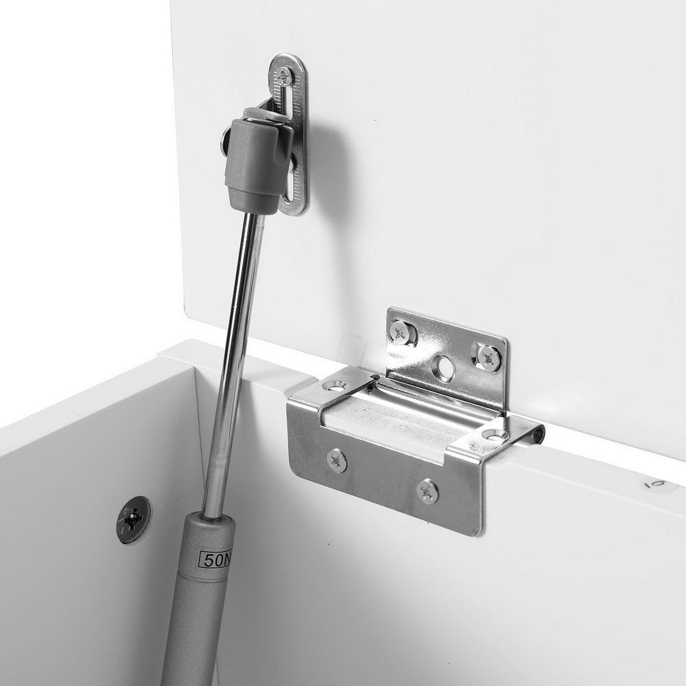 Storage Ottoman Blanket Box 140cm Fluted Grey showing close-up of metal hinge and gas lift mechanism inside the box