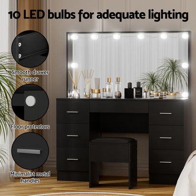 Dressing Table Vanity Desk Set Stool 10 Led Bulbs Black with mirror, storage drawers, and makeup accessories on wooden floor
