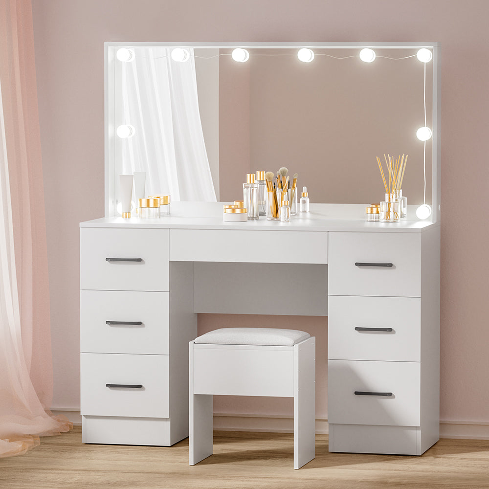 Dressing Table Set Stool 10 Led Bulbs White Debbie with storage drawers and cushioned stool shown with beauty accessories on wood floor