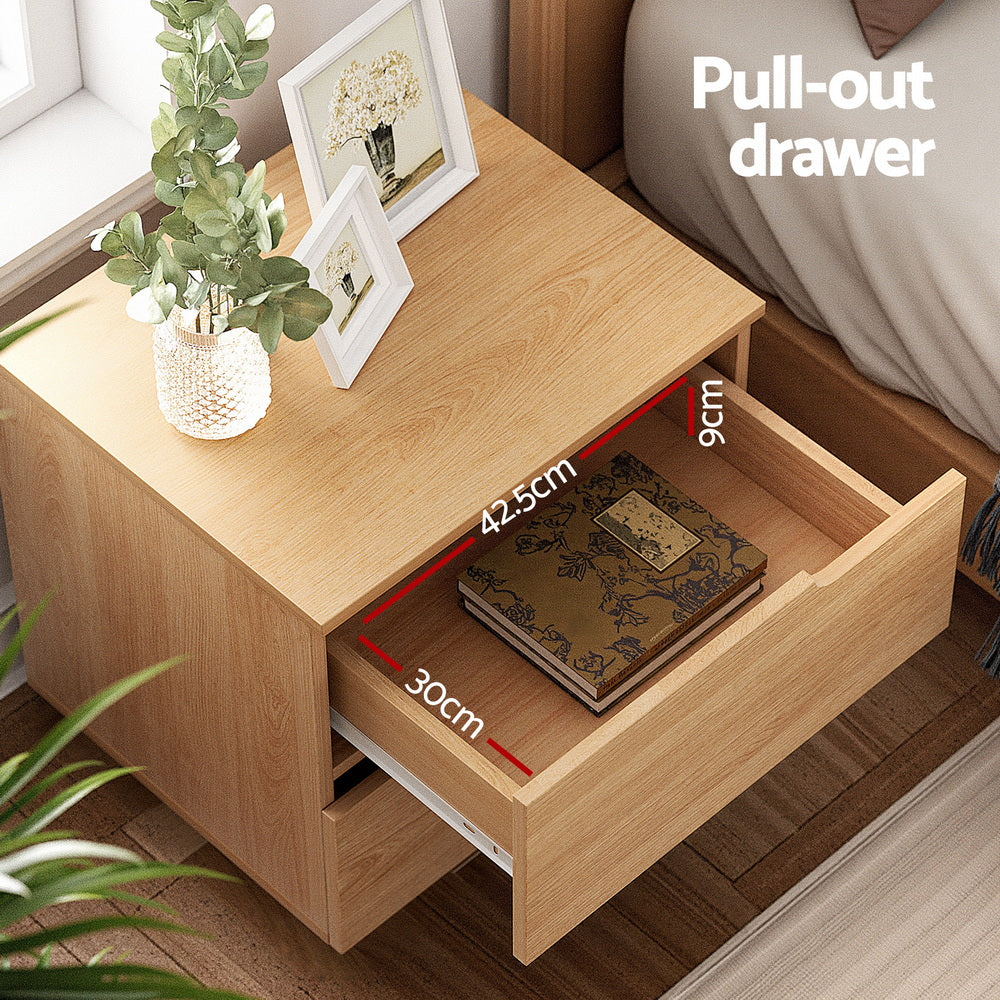 Bedside Table 2 Drawers Nightstand Pine with open pull-out drawer showing wood grain surface and framed photos on top