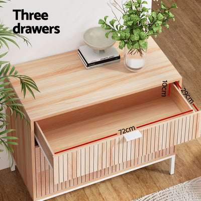 3 Chest of Drawers - LURA Pine with three spacious drawers, melamine finish, and white metal legs on wooden floor background