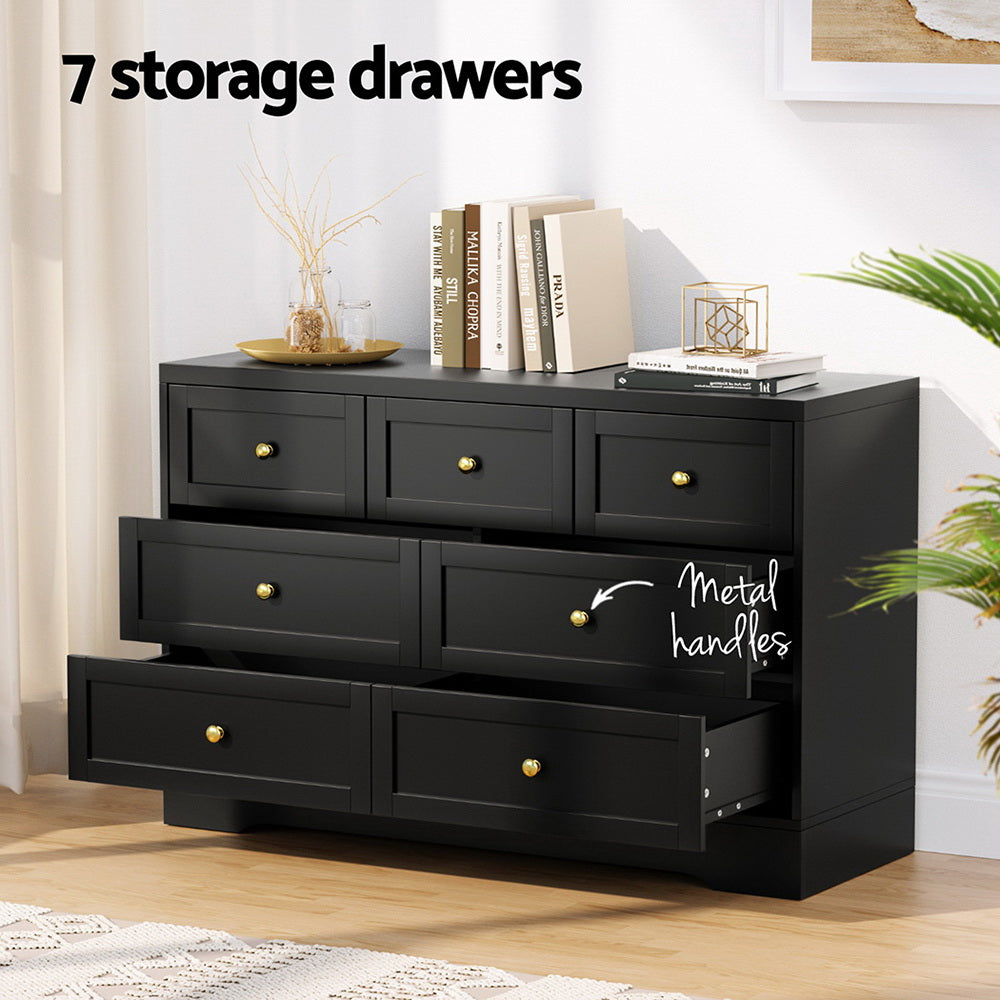 7-Drawer Chest of Drawers with Metal Handles - Black, showing open drawers and decorative items on top in a modern bedroom setting