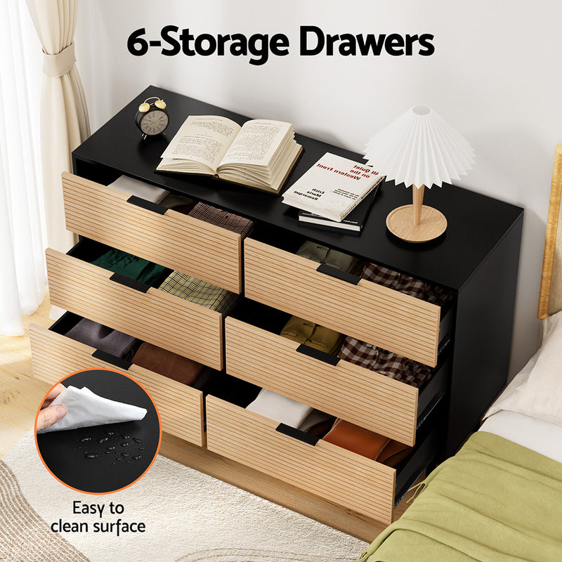 6 Chest of Drawers Dresser Table Black&Pine with six spacious drawers, fluted doors, and sleek metal handles in bedroom setting