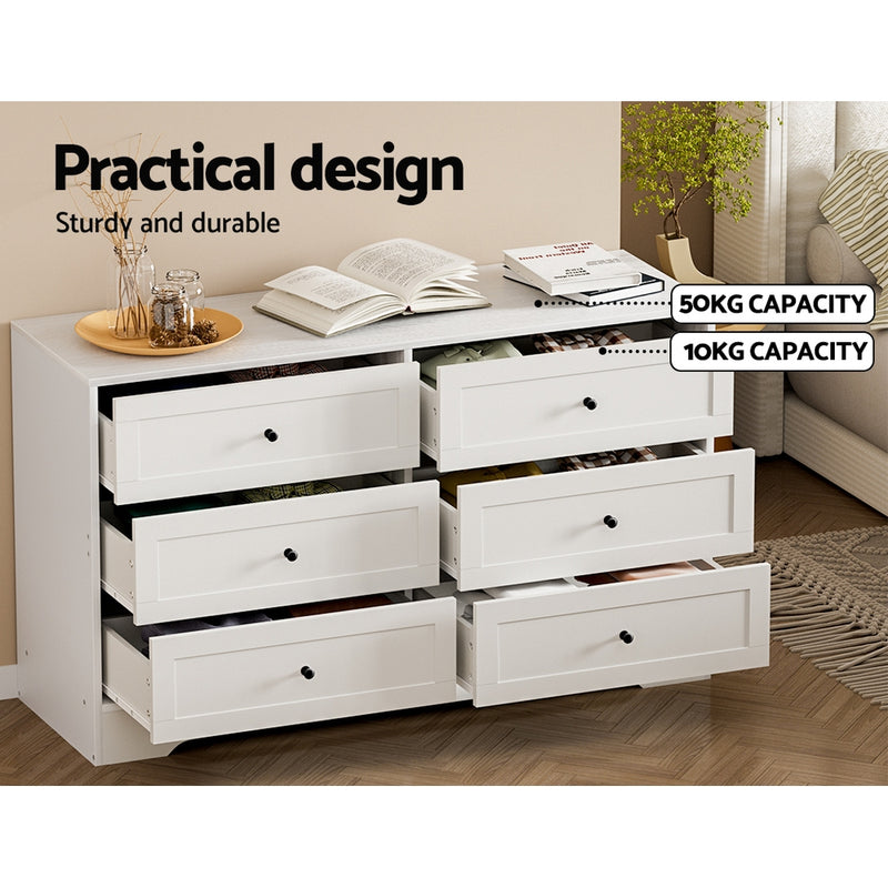 6 Drawer Classic Style Lowboy - White with six spacious drawers, sturdy design, and weight capacity labels on drawers in bedroom setting