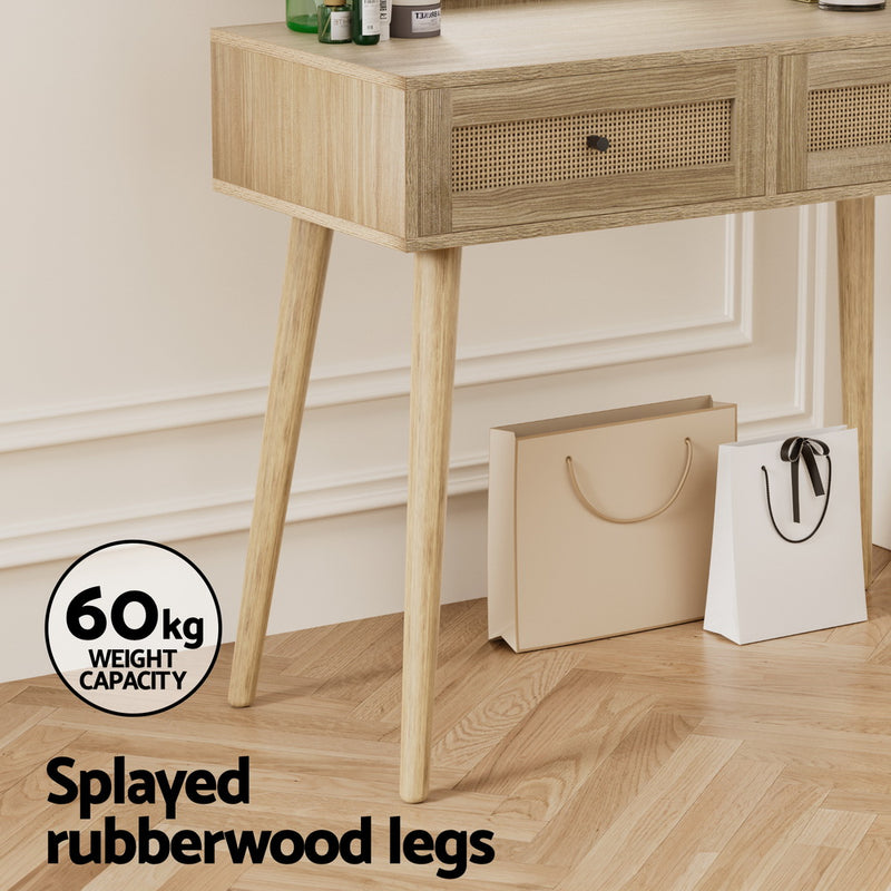 Close-up of Dressing Table Set Rattan Frances showing splayed rubberwood legs and natural rattan drawer fronts in bedroom setting