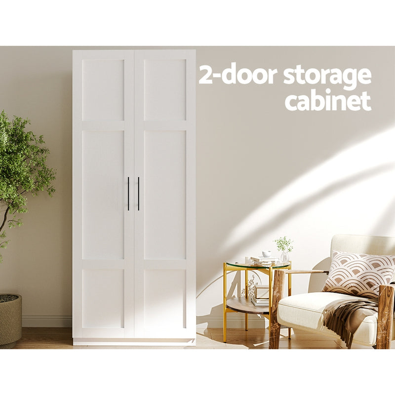 2 Door Wardrobe Bedroom Cupboard Closet Storage Cabinet Organiser White in bright room with chair, side table, and plant