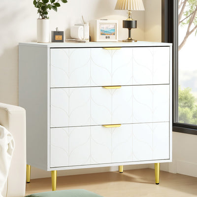 White 3-Drawer Chest of Drawers – Carved Pattern Tallboy with gold handles and legs, styled in a bright bedroom setting