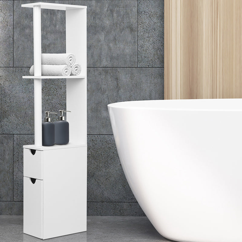 Bathroom Cabinet Storage 118cm Shelf White with open shelves, two drawers, and decorative items by a bathtub on gray tile floor
