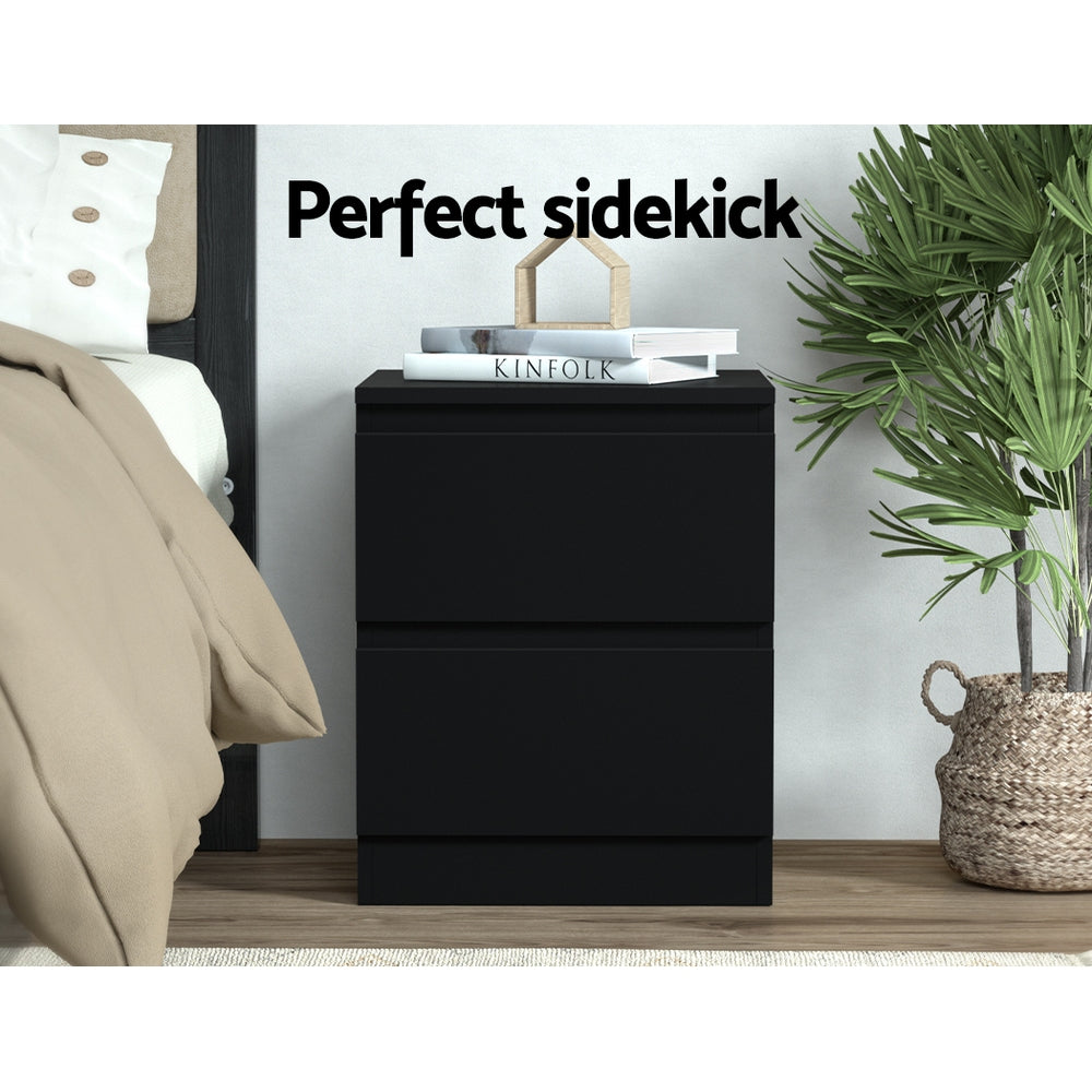 2x Bedside Table 2 Drawers - PEPE Black with clean lines, two deep drawers, styled next to bed and plant in bedroom setting