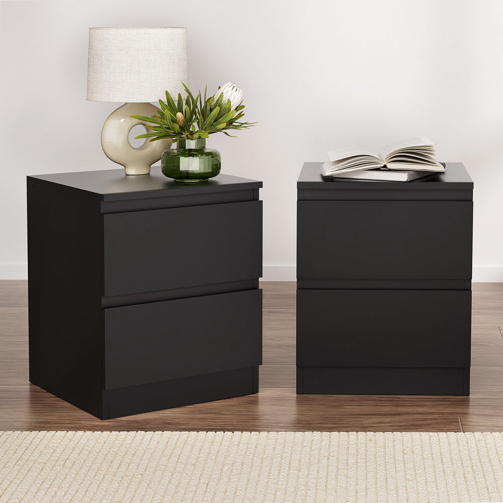 2x Bedside Table 2 Drawers - PEPE Black twin pack bedside tables with clean lines in a bedroom setting