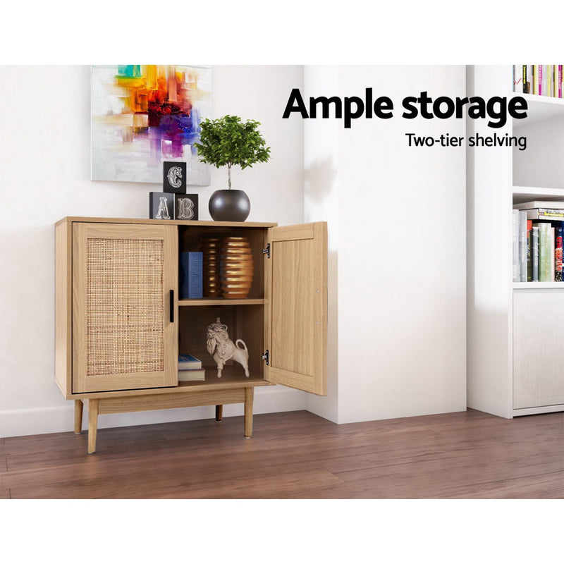Rattan Sideboard Cabinet in oak finish with two-tier shelving, decorative items inside, set on wooden legs in modern room
