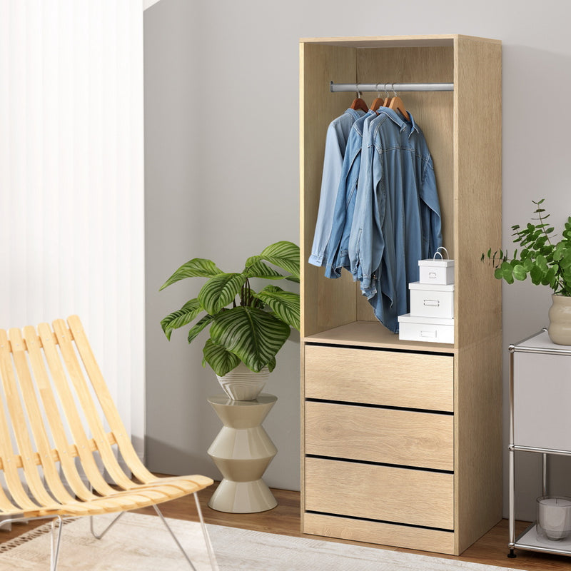 Wardrobe Clothes Closet Storage Organiser Pine with three drawers, metal rail, hanging shirts, and decorative storage boxes