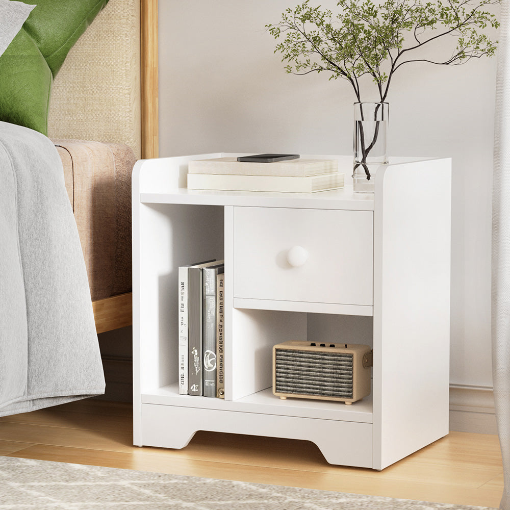Modern Bedside Table with Drawer - White with cubby storage, drawer, and decorative items in a bedroom setting beside bed