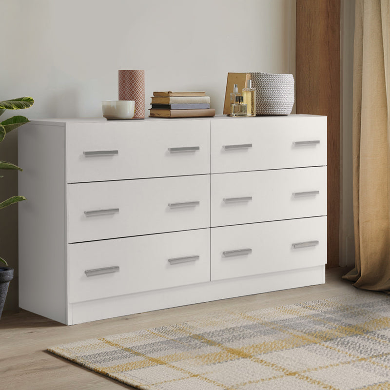 6 Drawer Lowboy Storage Dresser White with sleek handles, melamine finish, styled with decor on top in bedroom setting