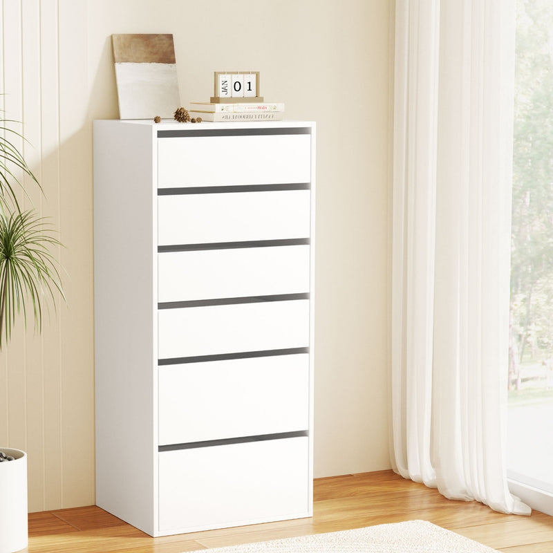 6-Drawer Tallboy Cabinet - White with sleek design, spacious drawers in a bright bedroom setting with natural light and decor items