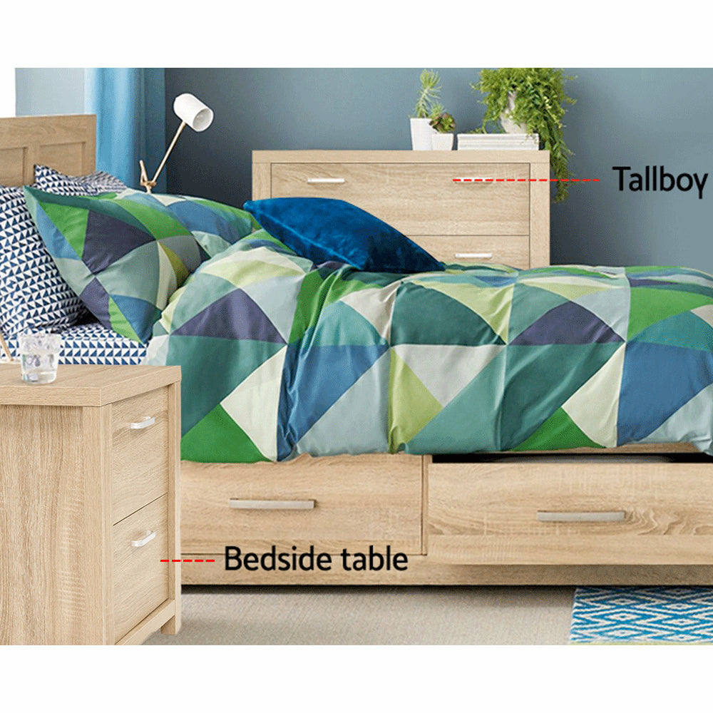2x Bedside Table 2 Drawers - MAXI Pine twin pack with natural wood finish in bedroom setting next to bed with colorful bedding