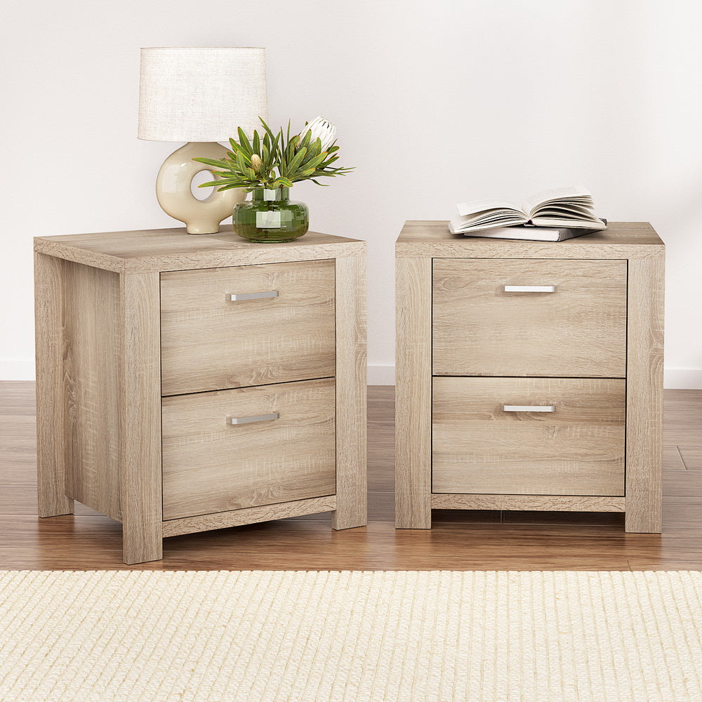 2x Bedside Table 2 Drawers - MAXI Pine twin pack with light pine finish, two drawers, styled with lamp and book