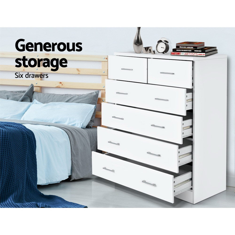 6 Drawer Tallboy White with six spacious drawers, sleek metal handles, and a clean melamine finish in a bedroom setting