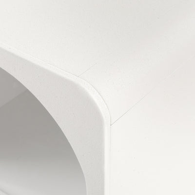 Close-up of the textured surface and curved edge of the Arched Textured Bedside Table White for bedroom furniture.
