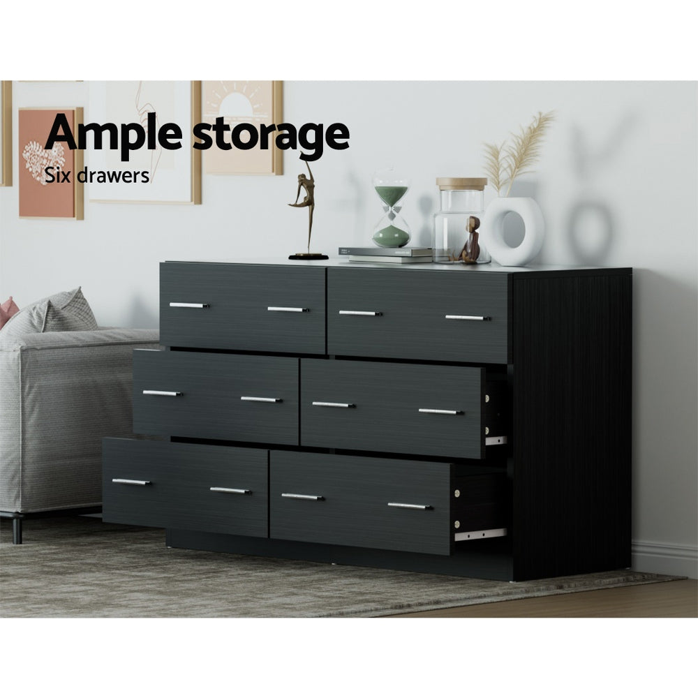 6 Drawer Lowboy Dresser - Black with metal handles, spacious drawers, styled with decorative items in modern bedroom setting