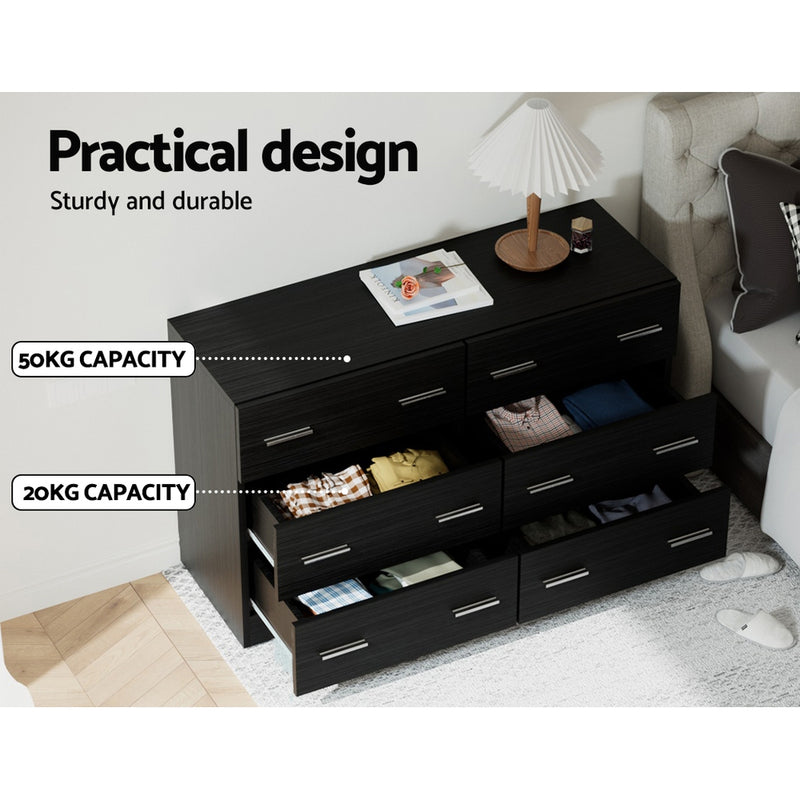 6 Drawer Lowboy Dresser - Black with metal handles, six drawers, shown with folded clothes and a lamp on top