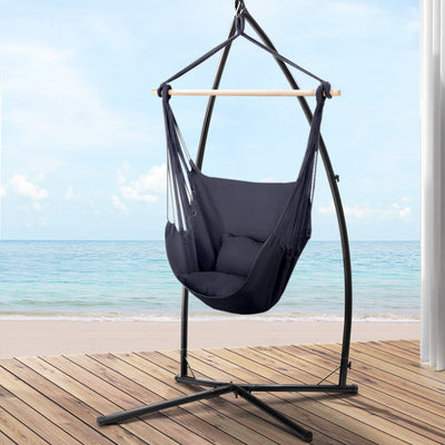 Outdoor Hammock Chair with Steel Stand Hanging Hammock with Pillow Grey on wooden deck by the ocean under blue sky