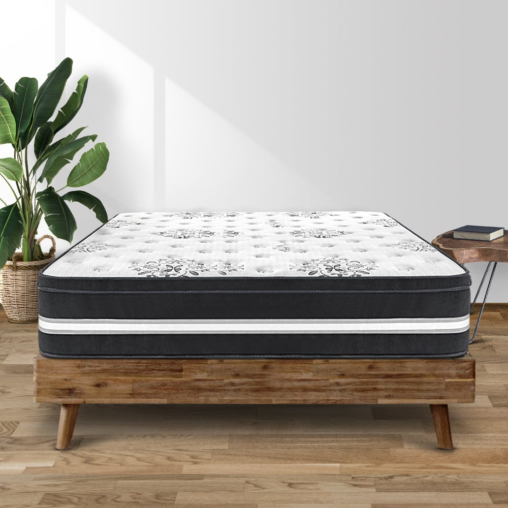 Donegal Euro Top Cool Gel Pocket Spring Mattress 34cm Thick - King on wooden bed frame in bright room